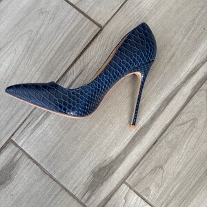 Blue croc embossed, 3.4” stiletto heels. Never worn . Size 7.5